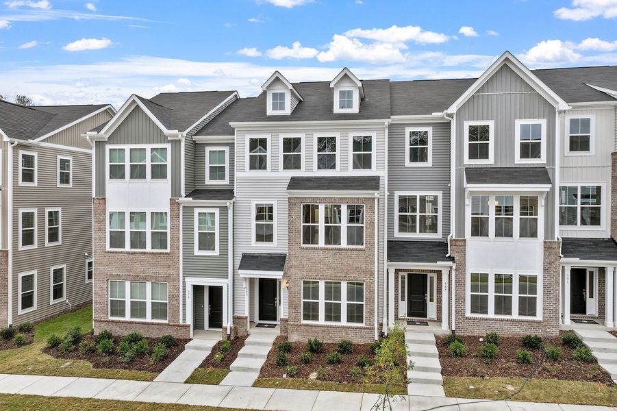 Front exterior of a new home in Renaissance at White Oak, Garner, NC, highlighting curb appeal (Image 25).