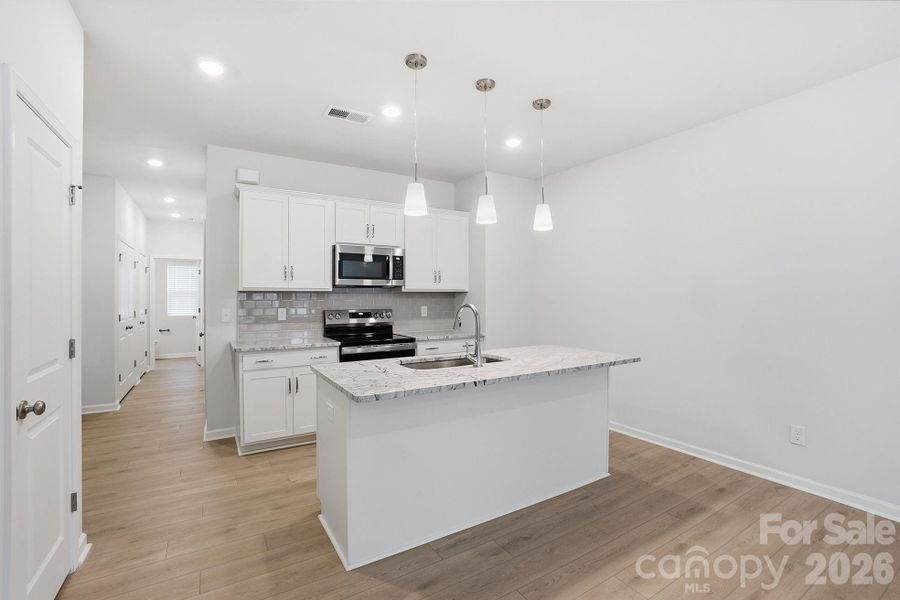 Furnished interior view inside a new home in Sloan Station, Charlotte (Image 9).