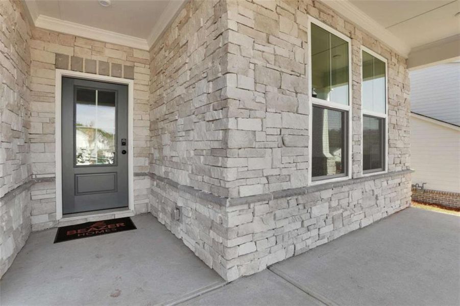 Exterior details and patio area of a home in The Paddocks at Doc Hughes, Buford (Image 26).