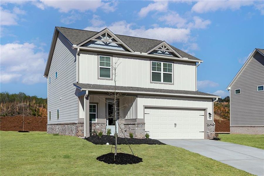 Front exterior of a new home in Mount Tabor Pointe, Dallas, GA, highlighting curb appeal (Image 1).