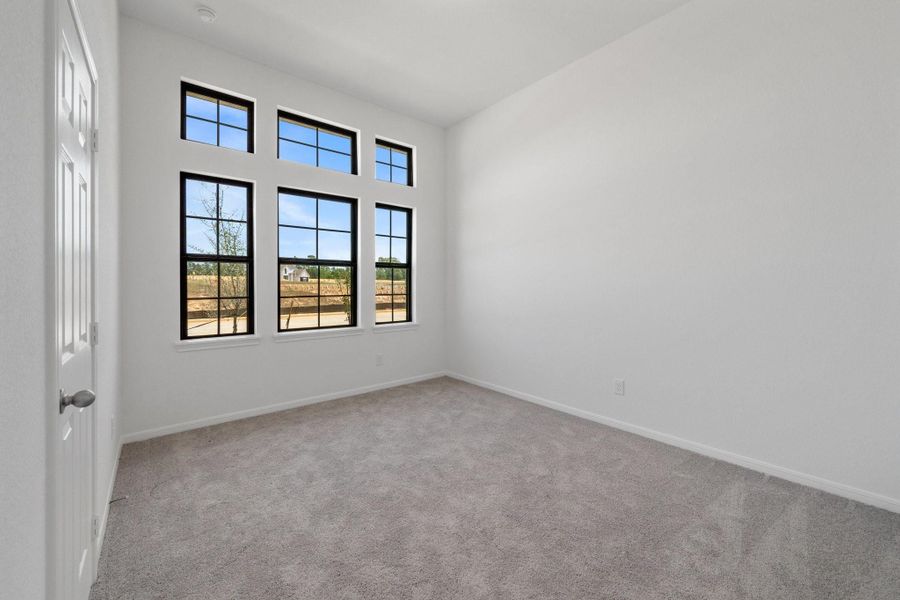 Spacious, unfurnished interior of a new home in Spring Creek Trails, Magnolia (Image 16).