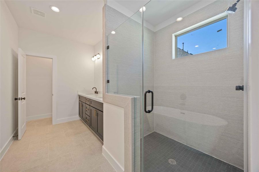 Primary bath with walk in shower and double vanity Primary bath with walk in shower and double vanity