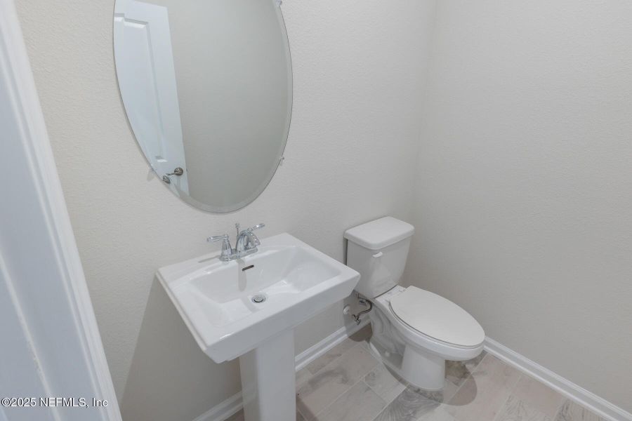 Furnished interior view inside a new home in Lakes at Bella Lago, Green Cove Springs (Image 16).