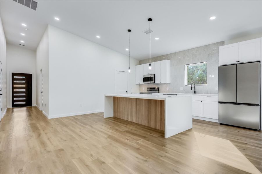 To be built. Photos are from a previous project with same Floorplan. Finishes may vary