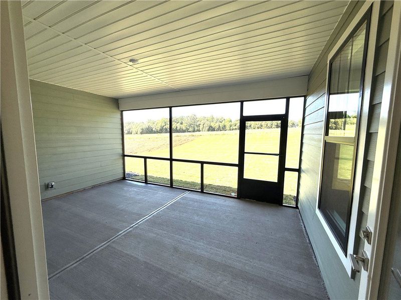 Enjoy tranquil views from this spacious screened-i