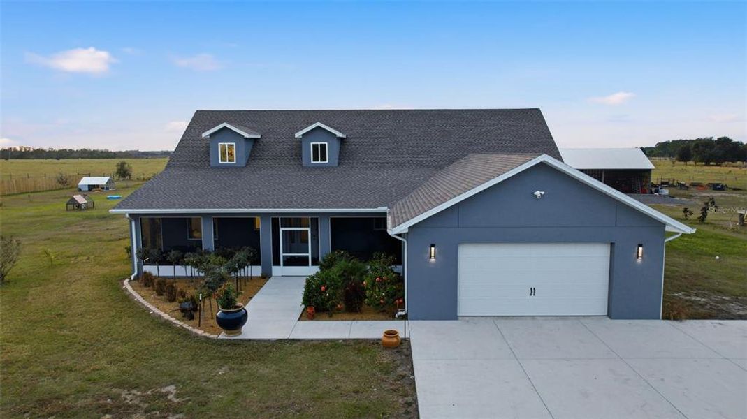 Front exterior of a new home in , Dade City, FL, highlighting curb appeal (Image 31).