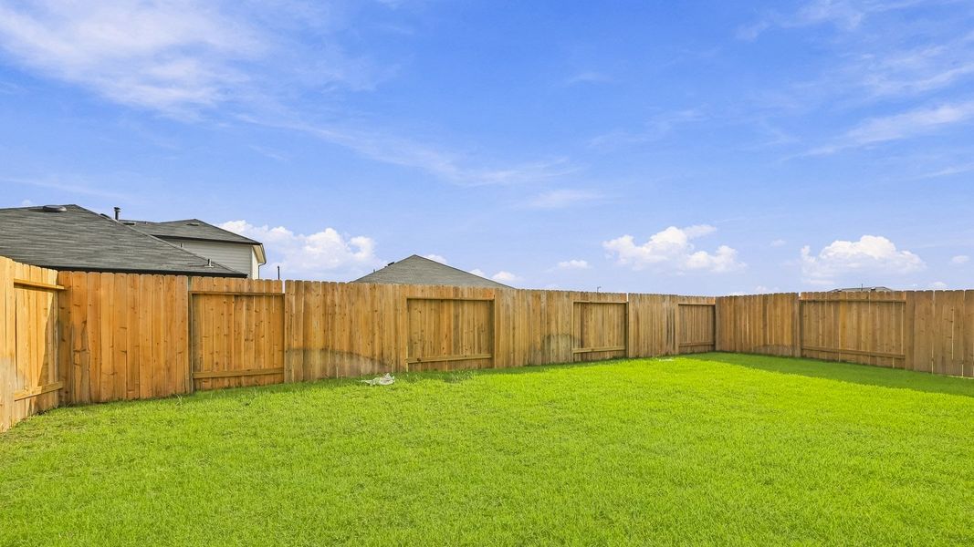 Exterior details and patio area of a home in Mill Creek, Magnolia (Image 25).