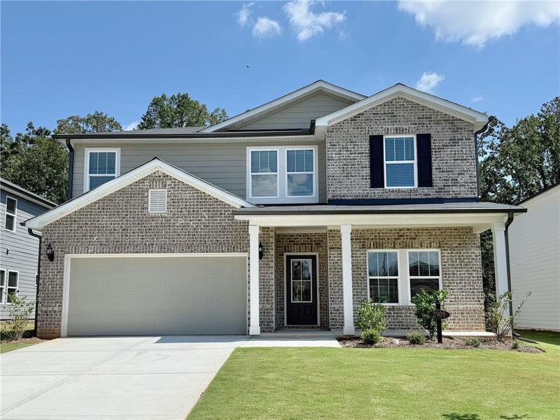 Front exterior of a new home in , Braselton, GA, highlighting curb appeal (Image 2).