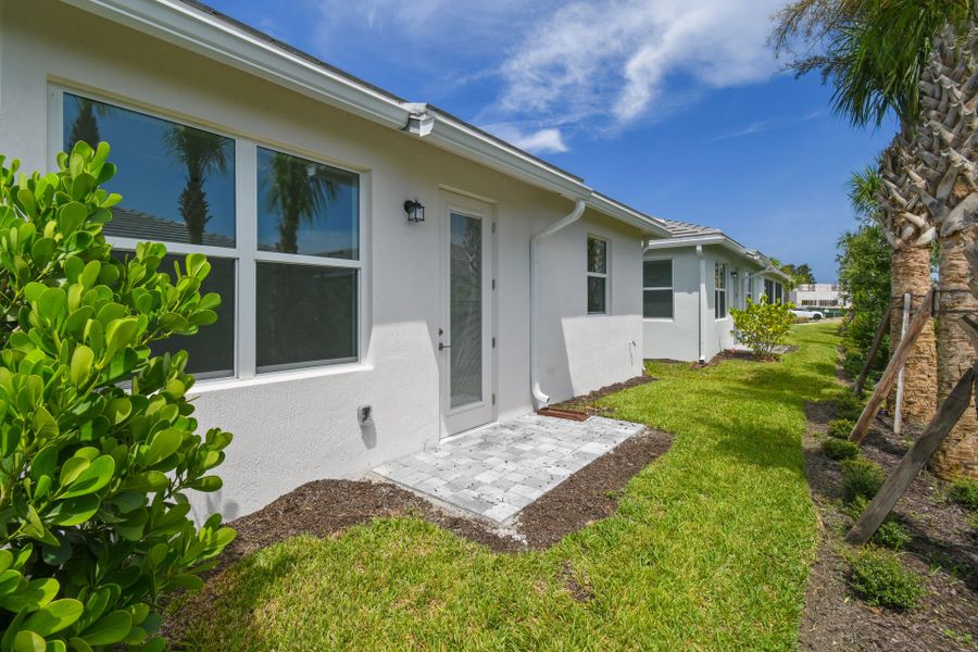 Exterior details and patio area of a home in Harbor Isle, Vero Beach (Image 30).