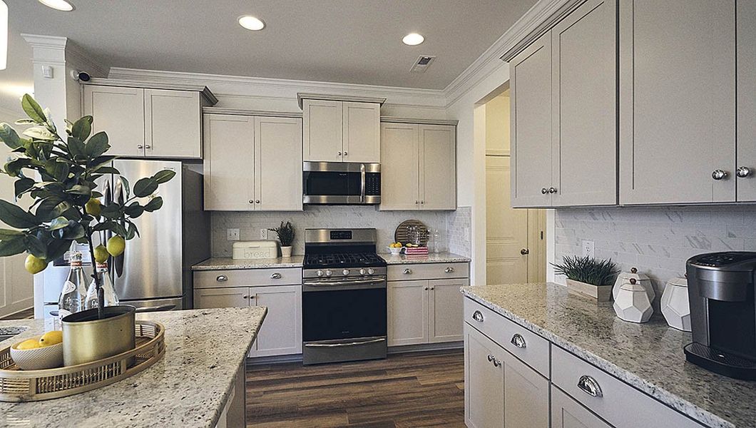 Furnished interior view inside a new home in The Meadows at Kinsley, Jamestown (Image 8). Furnished interior view inside a new home in The Meadows at Kinsley, Jamestown (Image 8).