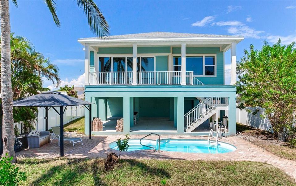 Front exterior of a new home in , Treasure Island, FL, highlighting curb appeal (Image 25).