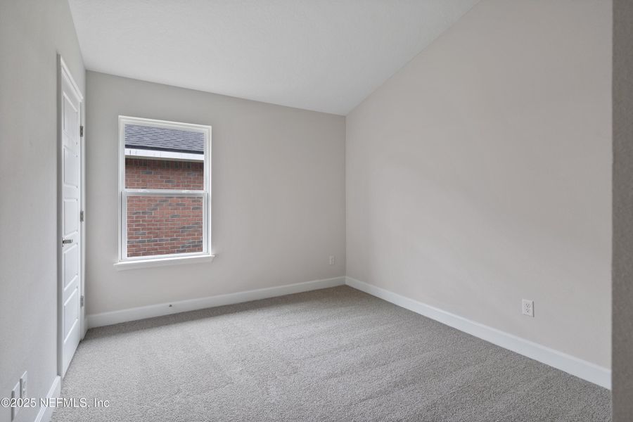 Spacious, unfurnished interior of a new home in Shadow Crest at Rolling Hills, Green Cove Springs (Image 19).