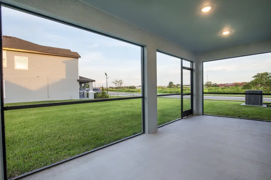 Exterior details and patio area of a home in Enclave At Seminole Palms, Palm Coast (Image 4). Exterior details and patio area of a home in Enclave At Seminole Palms, Palm Coast (Image 4).