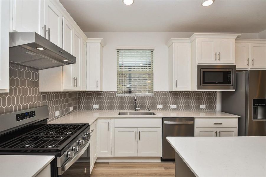 Who wouldn't want to cook in this gourmet modern kitchen