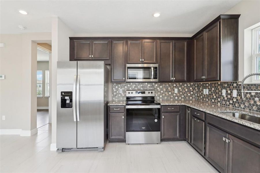 Furnished interior view inside a new home in Laureate Park, Orlando (Image 15).