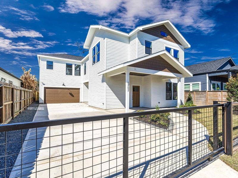 Front exterior of a new home in , Houston, TX, highlighting curb appeal (Image 27). Front exterior of a new home in , Houston, TX, highlighting curb appeal (Image 27).