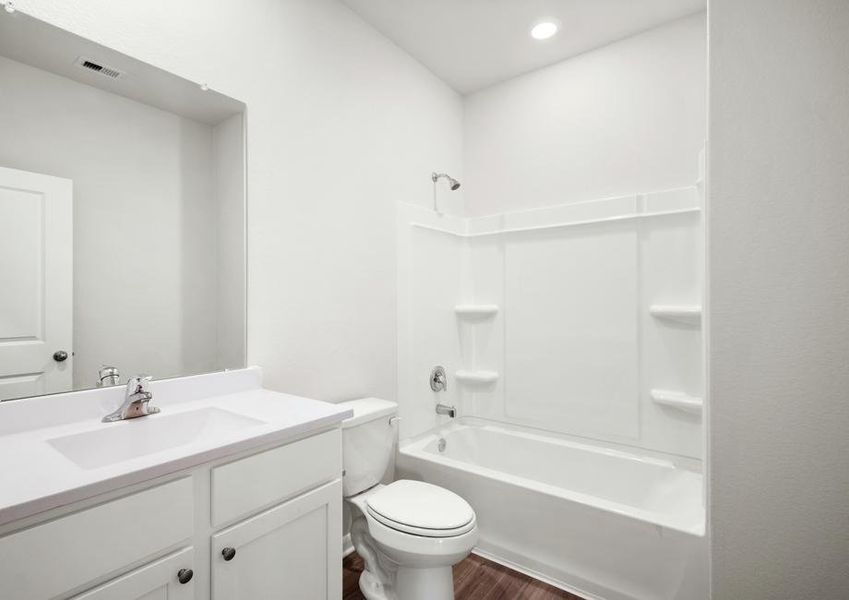 The secondary bathroom has a tub/shower combo.