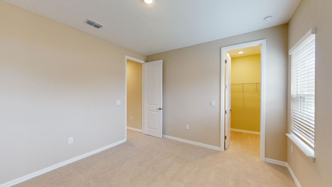 Representative unfurnished interior of a home built from the Barbuda by Taylor Morrison in Headwaters at Lofton Creek, Yulee (Image 41).