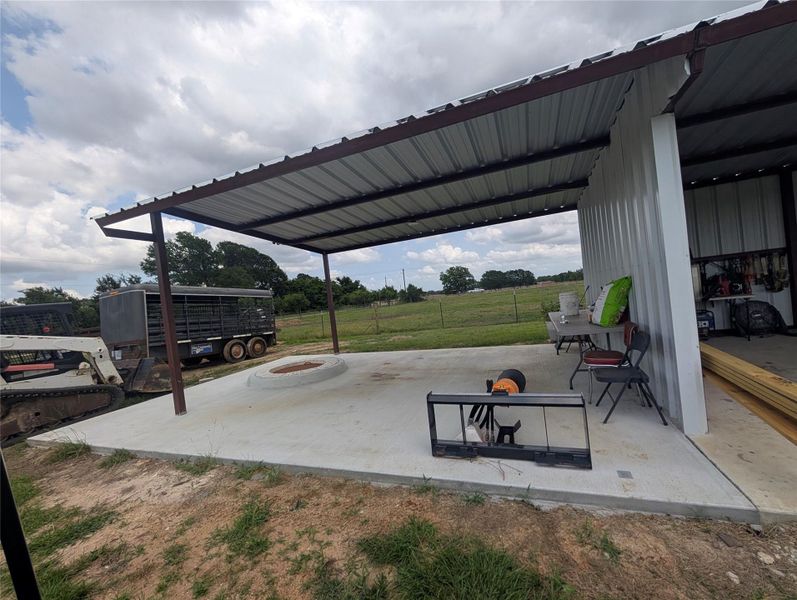 What would you use this space for?  At first it was a gathering place for smores n hot dogs.  Pull your tractor or lawn mower under.  You can always uses more covered space