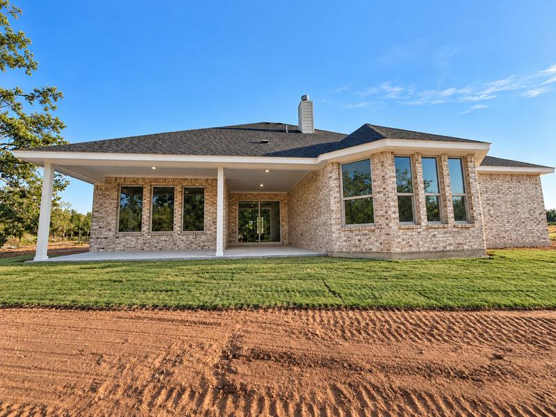 Exterior details and patio area of a home in Terra Vista Estates, Springtown (Image 4).