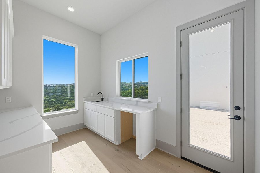 Furnished interior view inside a new home in Rough Hollow, Austin (Image 16). Furnished interior view inside a new home in Rough Hollow, Austin (Image 16).