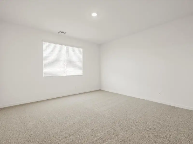 Spacious, unfurnished interior of a new home in Mesquite Mountain Ranch at Frontera, Surprise (Image 10).
