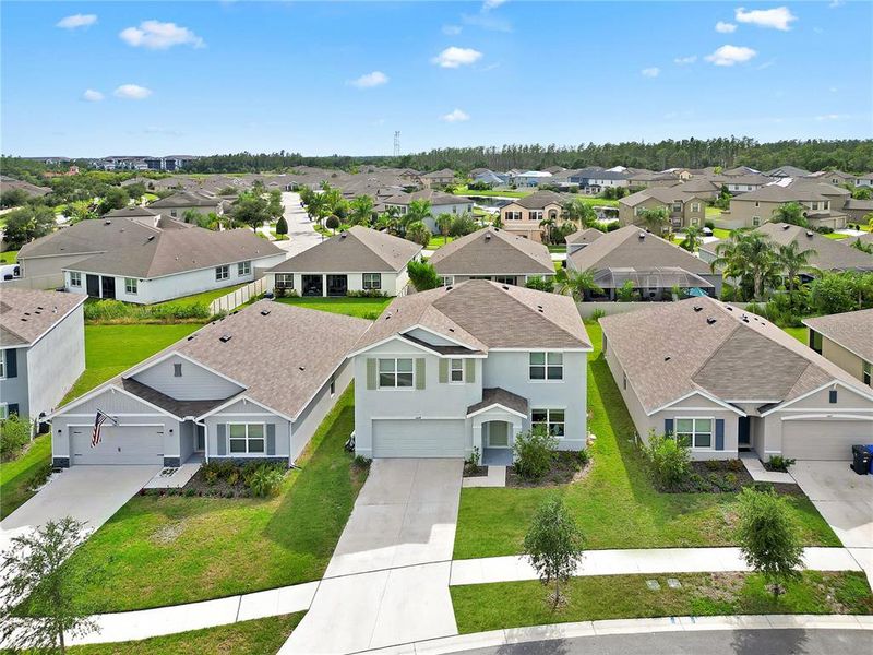 Front exterior of a new home in , Wimauma, FL, highlighting curb appeal (Image 1).