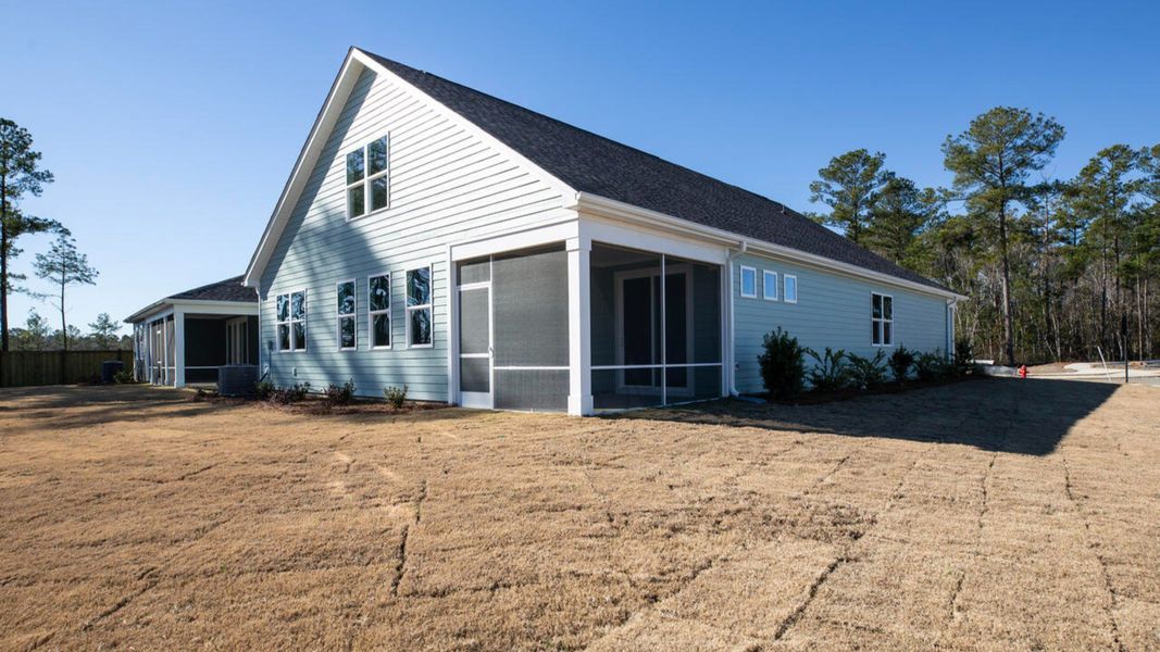 Exterior details and patio area of a home in The Haven at Indigo Preserve, Leland (Image 3).