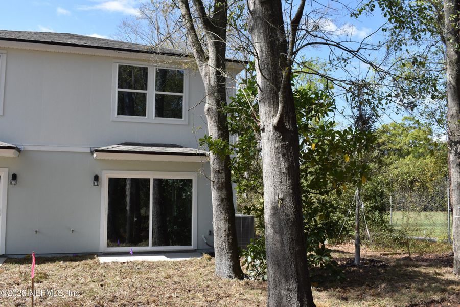 Exterior details and patio area of a home in Irongate Villas, Jacksonville (Image 28).