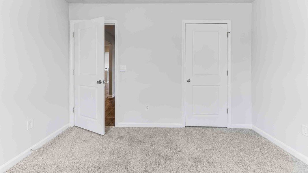 Spacious, unfurnished interior of a new home in Cedar Hill Landing, Navassa (Image 14).