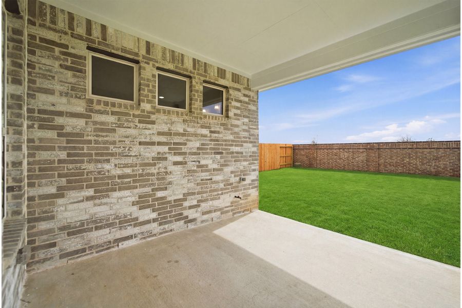 Exterior details and patio area of a home in Sunterra Lakes, Brookshire (Image 30). Exterior details and patio area of a home in Sunterra Lakes, Brookshire (Image 30).