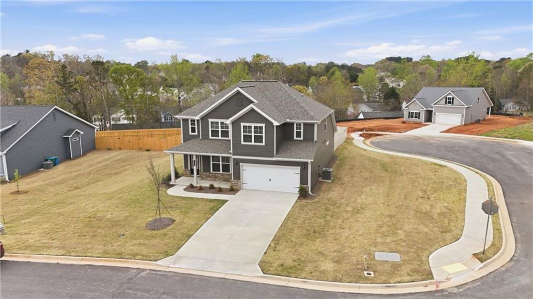Front exterior of a new home in , Commerce, GA, highlighting curb appeal (Image 28).