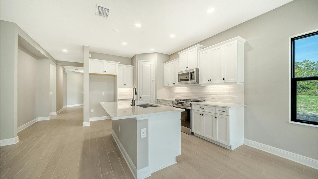 Furnished interior view inside a new home in Vicenza Real Estate and Homes for Sale in North Venice, FL - Neal Communities, Venice (Image 8).