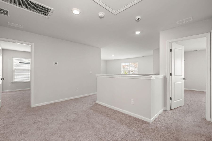 Spacious, unfurnished interior of a new home in The Ponds, Summerville (Image 23).