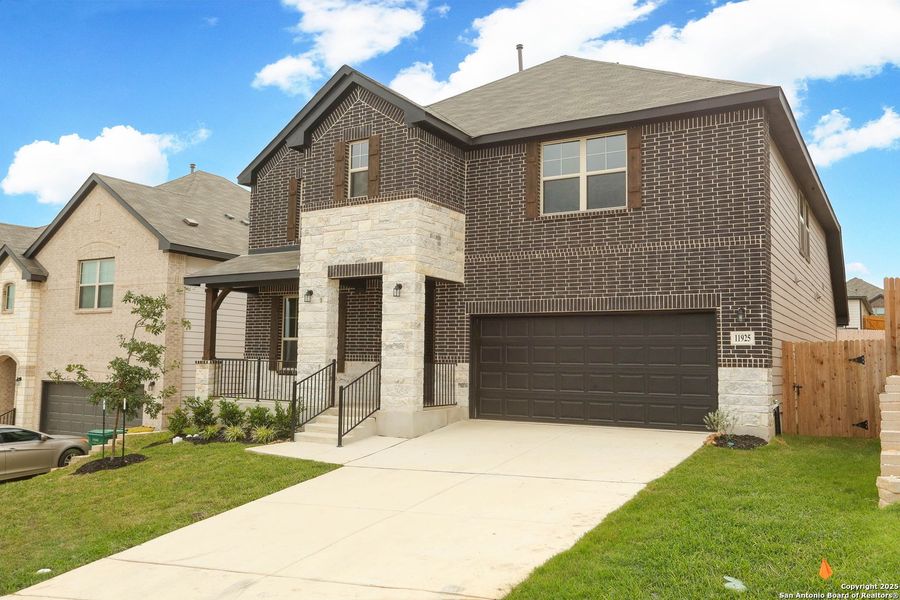 Front exterior of a new home in Vista Ridge, Live Oak, TX, highlighting curb appeal (Image 20). Front exterior of a new home in Vista Ridge, Live Oak, TX, highlighting curb appeal (Image 20).