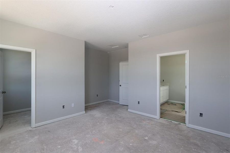 In-progress construction of a new home in Tribute at Ovation, Winter Garden, FL (Image 26).