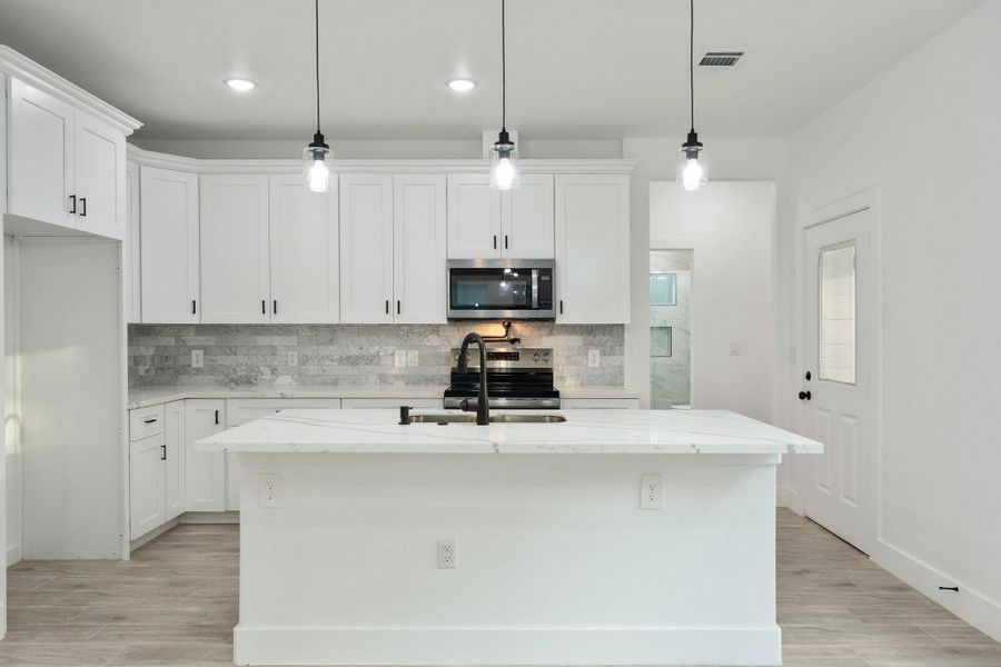 Furnished interior view inside a new home in , Willis (Image 7). Furnished interior view inside a new home in , Willis (Image 7).