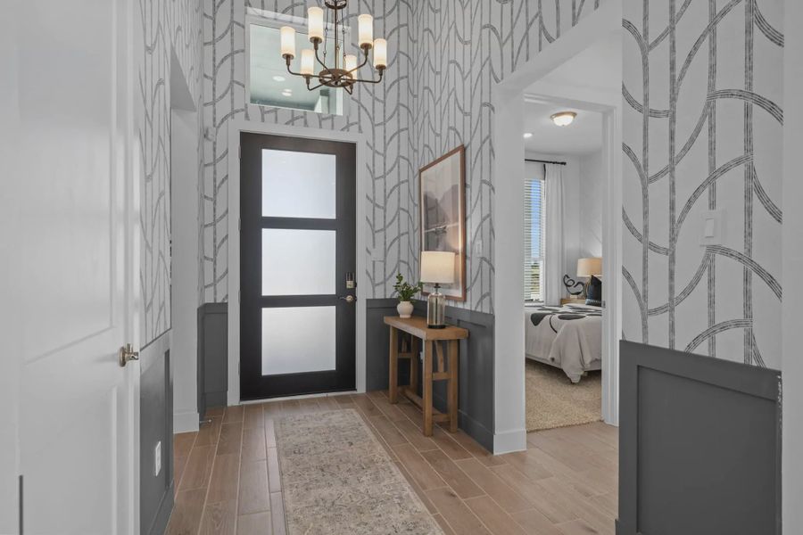 Representative furnished interior of a home built from the PT Bonneville by Chesmar Homes in Attwater, Waller (Image 4).