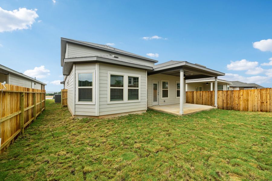 Back exterior of the Reynolds floorplan at a Meritage Homes community.