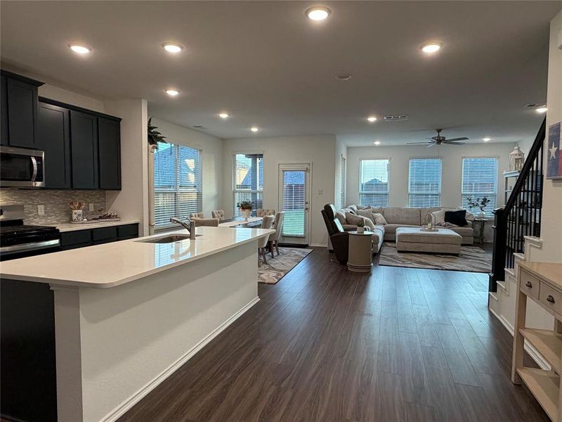 Opening into a Bright and Airy Open-Concept Layout Designed For Seamless Living