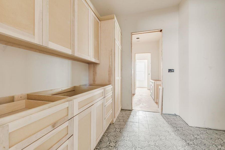 The built in shelves in the Laundry Room