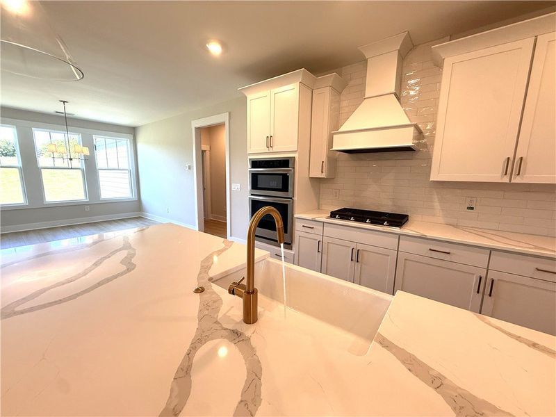 This bright kitchen features sleek appliances and