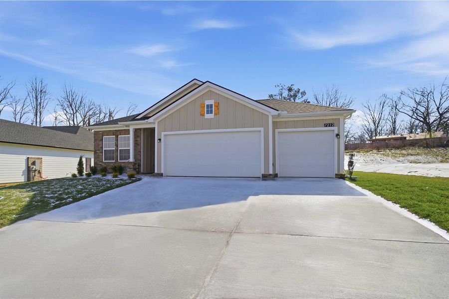 Front exterior of a new home in Brush Creek, Fairview, TN, highlighting curb appeal (Image 26).