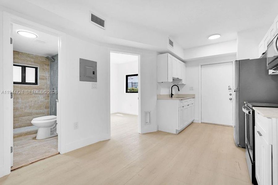 Furnished interior view inside a new home in , Miami (Image 8).