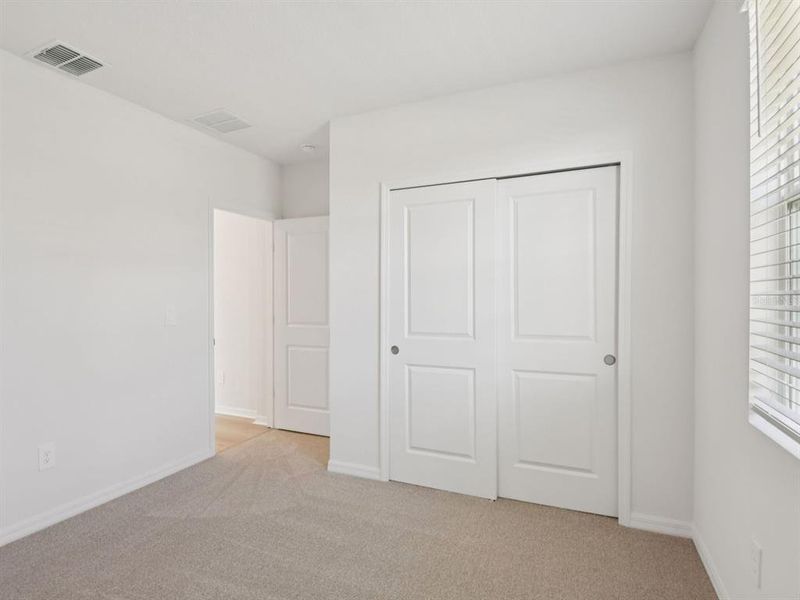 Spacious, unfurnished interior of a new home in The Grove at Stuart Crossing - Classic Series, Bartow (Image 25). Spacious, unfurnished interior of a new home in The Grove at Stuart Crossing - Classic Series, Bartow (Image 25).