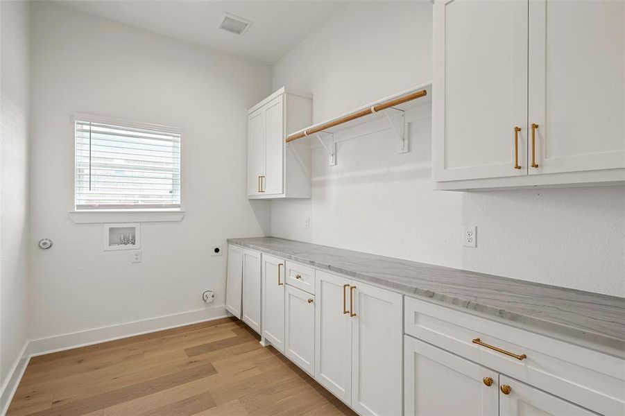Furnished interior view inside a new home in , Hewitt (Image 6).