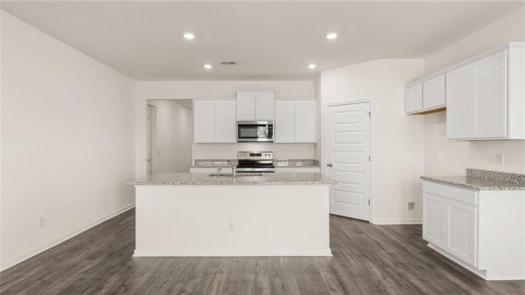 Furnished interior view inside a new home in Oakchase at Hampton, Hampton (Image 4).