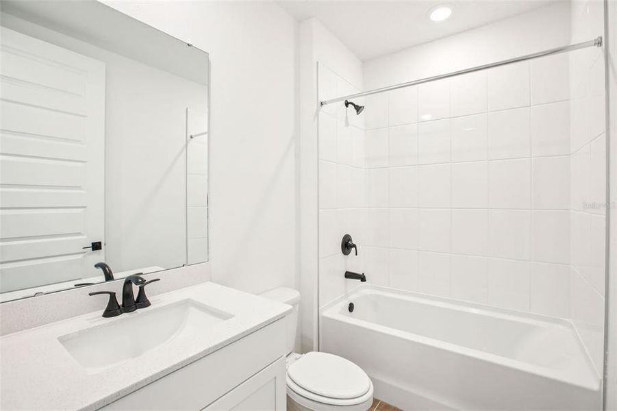 Furnished interior view inside a new home in Two Rivers - Signature Series, Zephyrhills (Image 10).