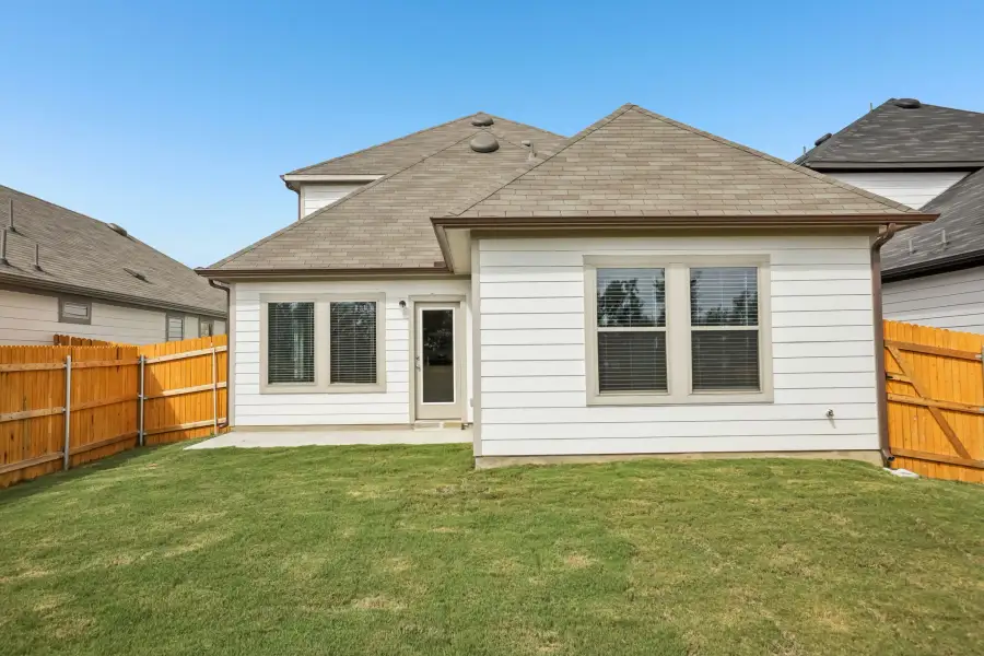 Exterior details and patio area of a home in Trinity Ranch, Elgin (Image 24).