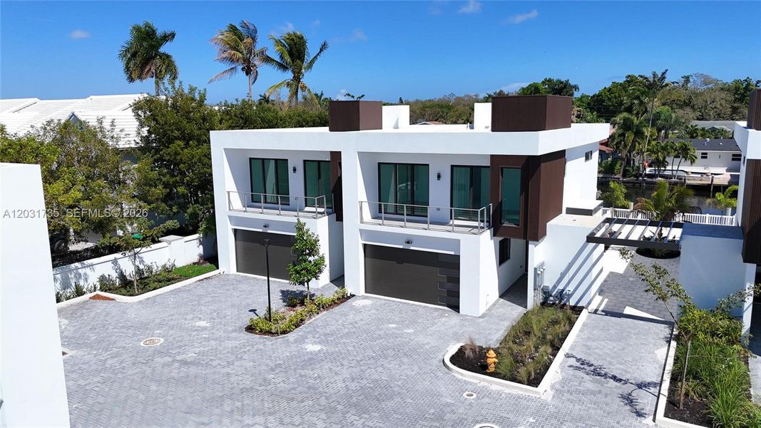 Front exterior of a new home in , Dania Beach, FL, highlighting curb appeal (Image 31).